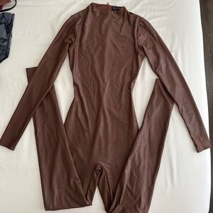 Naked Wardrobe Faux Leather Long Sleeve Jumpsuit in Rich Brown